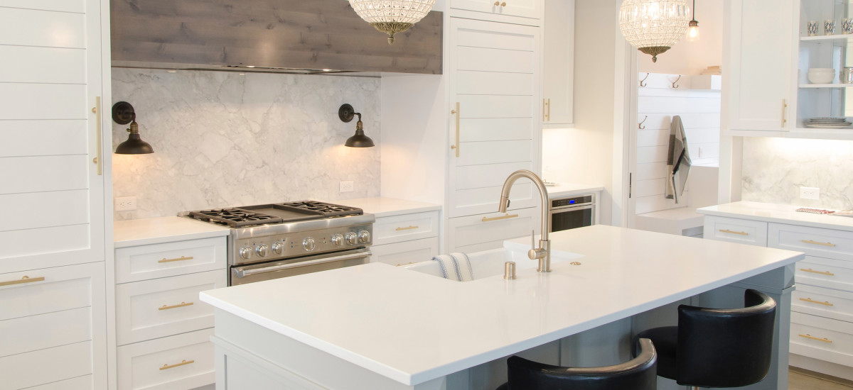 Stylistic kitchen with gold tint and island bench