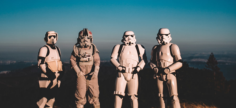 Rustic white kitchen, rug, and dining area