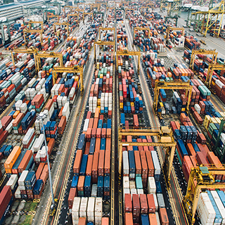 Long shot view of thousands of multi-coloured shipping containers