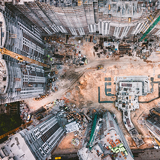 Aerial view of a construction site and high-rise buildings